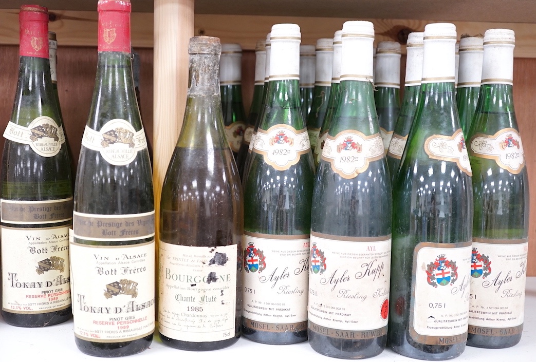 Sixteen bottles of Ayler Kupp Riesling Kabinett 1982, five bottles of Charles-Brintet Bourgogne Chardonnay 1985 and two bottles Bott Freres Tokay d’Alsace 1989 (24)